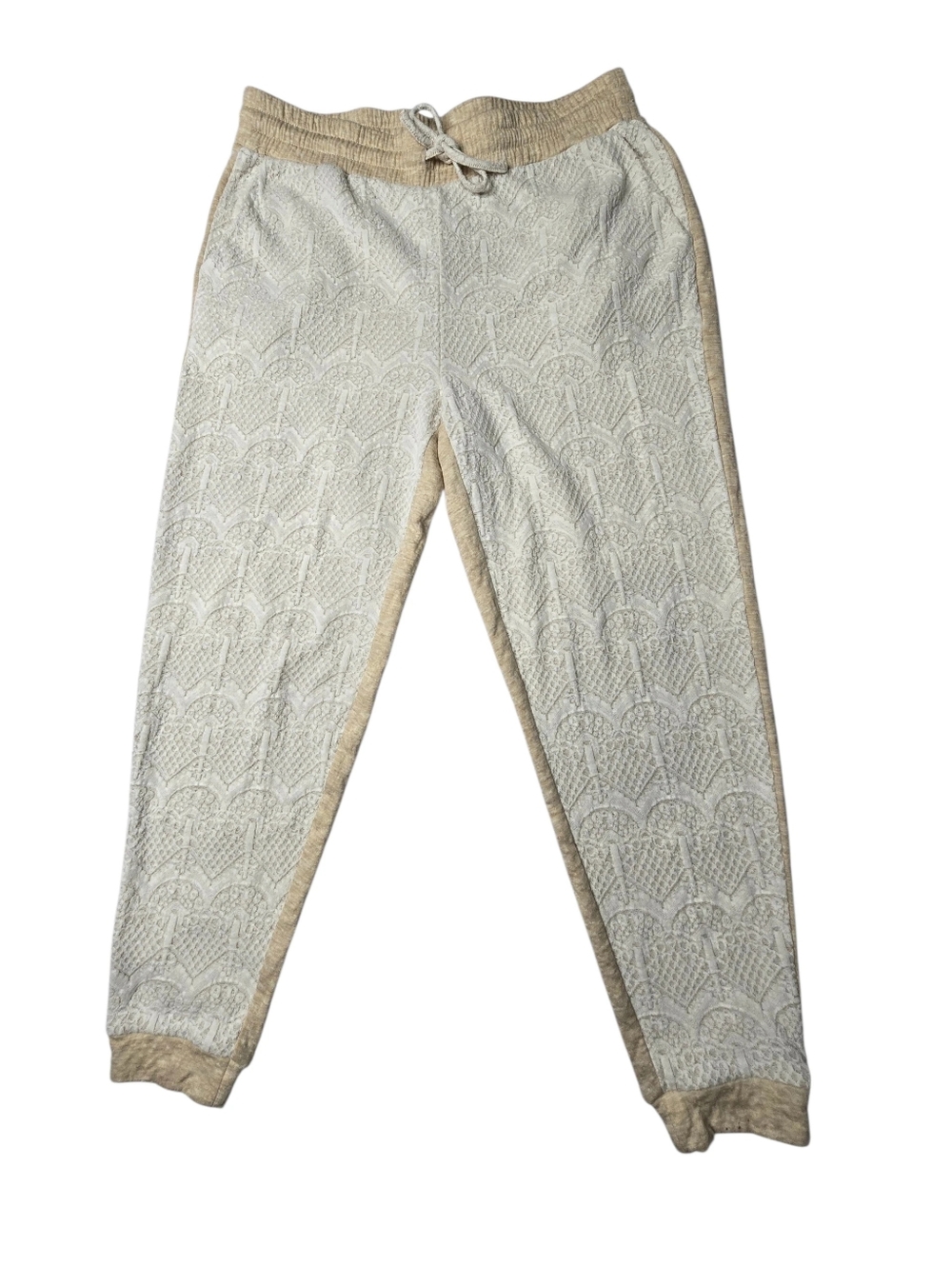 Cupio textured, patterned joggers featuring a drawstring waist and elastic ankle